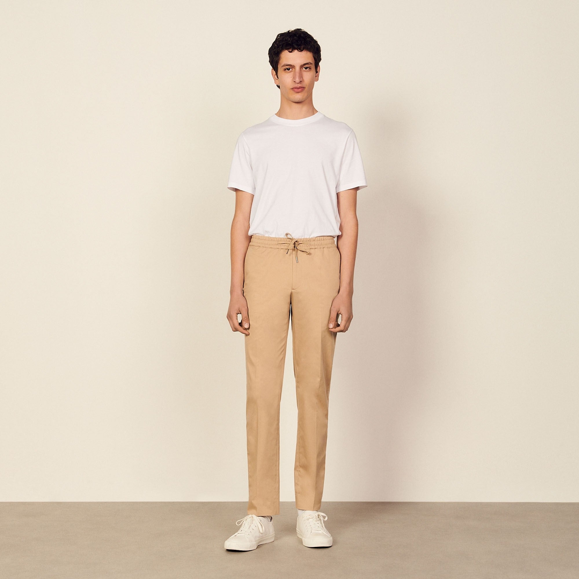 Men Cotton Carrot-Fit Trousers - Beige