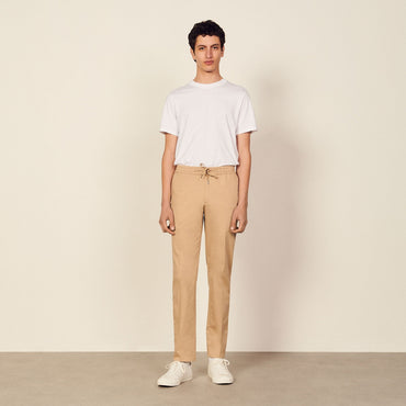 Men Cotton Carrot-Fit Trousers - Beige