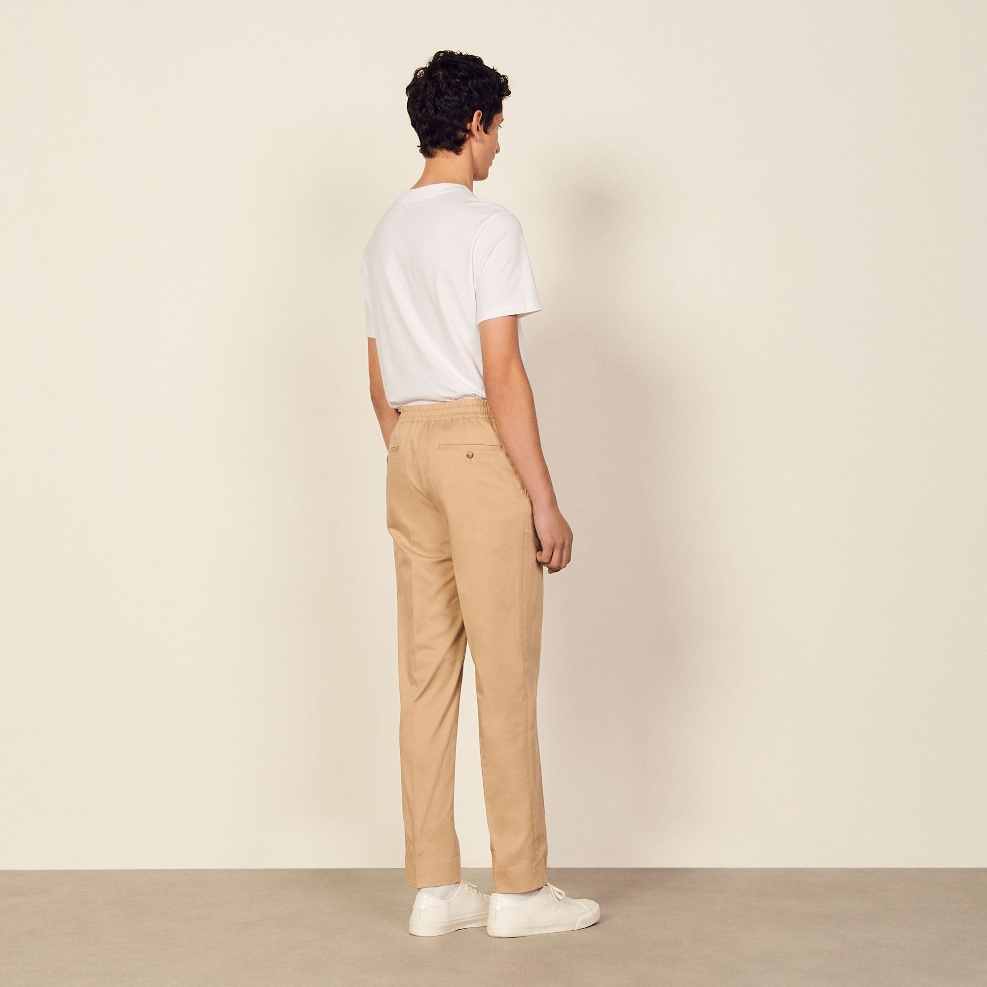 Men Cotton Carrot-Fit Trousers - Beige